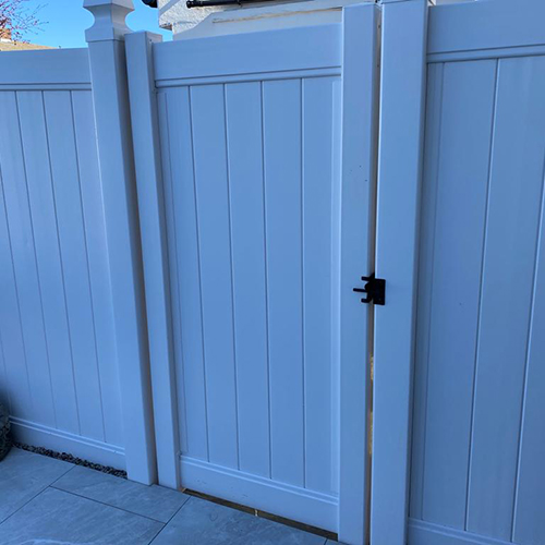 composite gate matching the fencing, garden design, essex