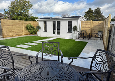 Garden landscapes, porcelain patio, artificial lawn and handmade slatted batten fencing Essex