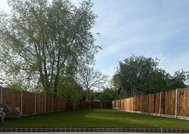Limestone porcelain patio in crema, new lawn, fencing around the garden, landscapers in Chigwell Essex