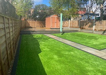artificial grass, Indian sandstone patio and pathway, landscaping Essex